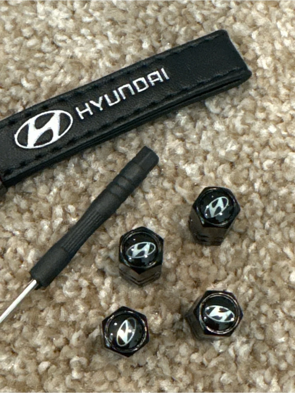 Hyundai Black Leather Keychain with Tire Valve Stem Caps